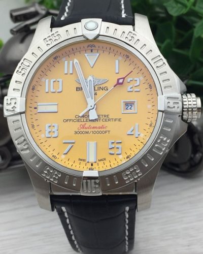 Breitling yellow face silver cases
